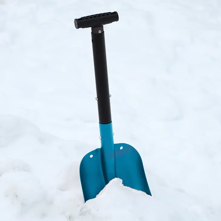 Hopfällbar snöskyffel